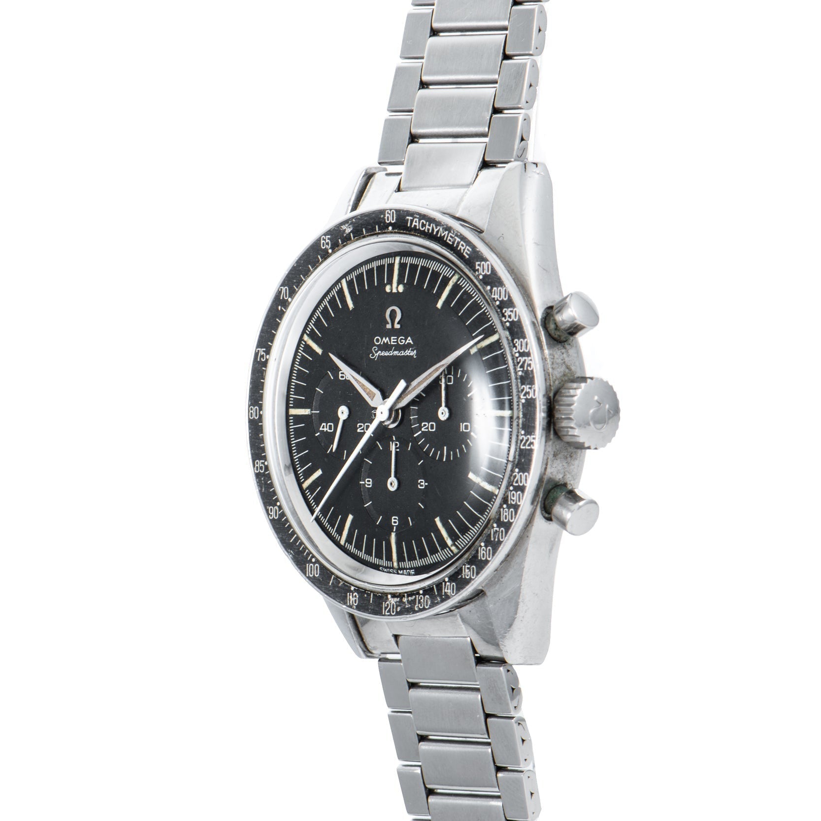 An OMEGA Speedmaster watch featuring a stainless steel case, black dial, and metal bracelet, shown from an angled view.