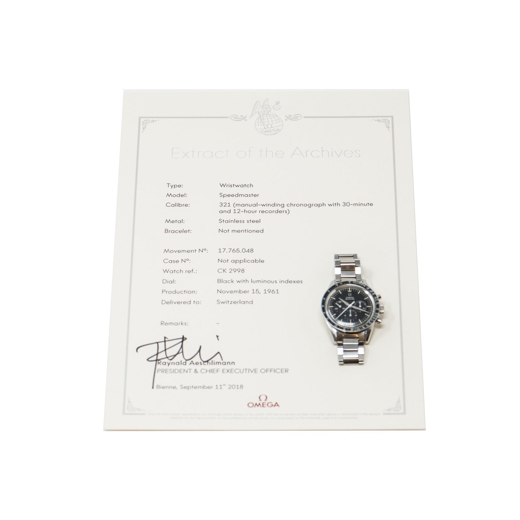 An OMEGA Speedmaster watch rests atop its official extract of archives document.