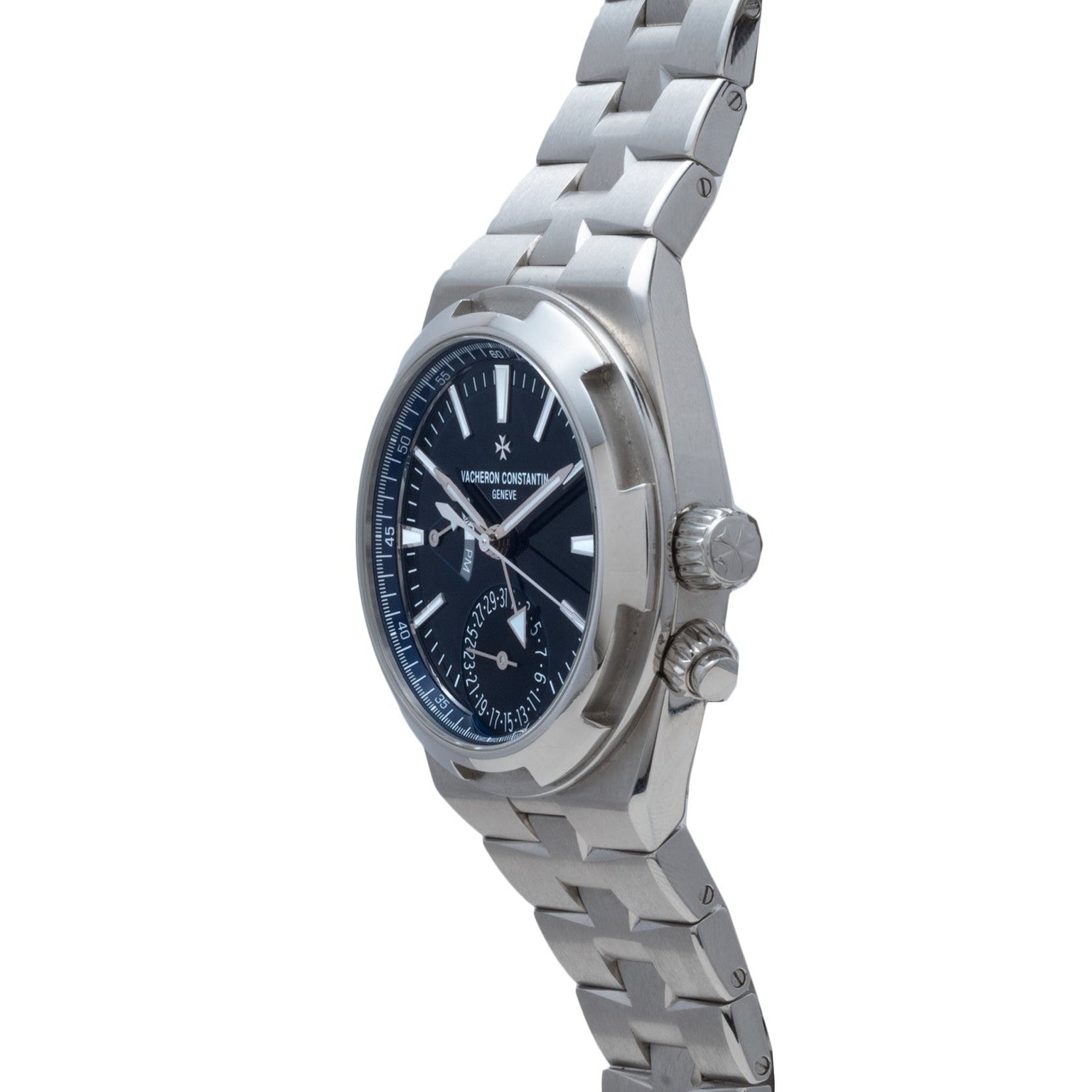 Vacheron Constantin Overseas Dual-Time wristwatch in silver with a blue dial and metal bracelet, shown from a side angle.