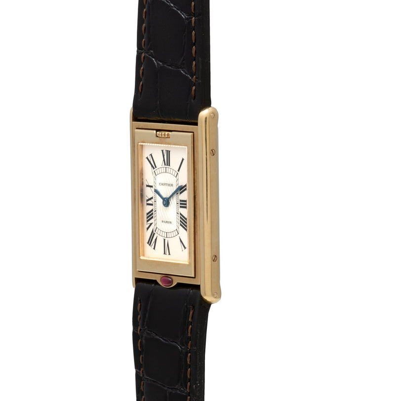 Cartier Tank Basculante Mécanique 150th Anniversary Limited Edition: gold rectangular case, white dial with Roman numerals, and black leather strap.