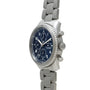 Breitling Navitimer 8 Chronograph with a blue chronograph dial and metal link bracelet, shown from an angled side view.