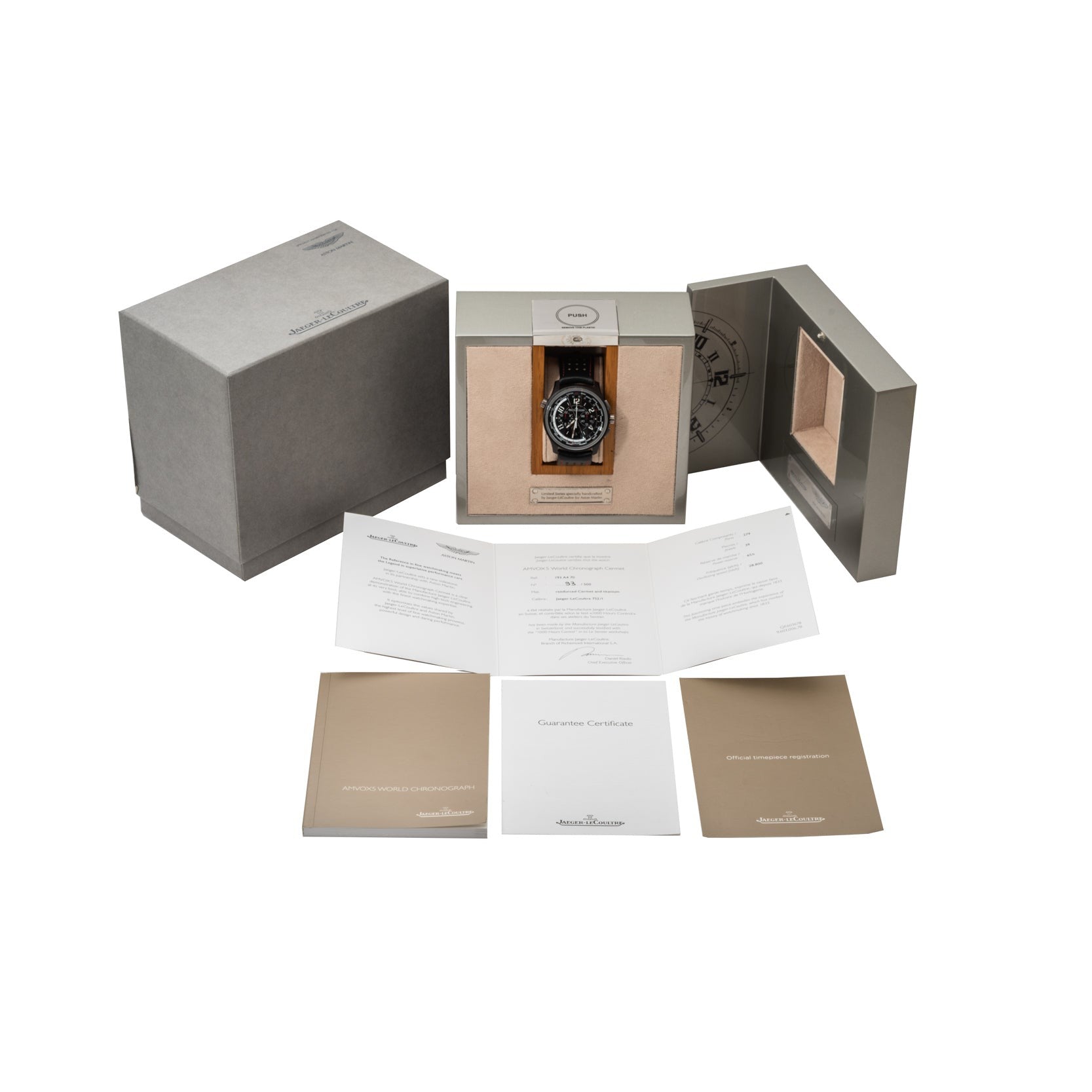 Jaeger-LeCoultre Amvox 5 World Chronograph wristwatch in an open display box, accompanied by documents, certificates, and the original Jaeger-LeCoultre outer packaging.