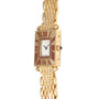 Gold-tone rectangular watch with cream dial, red Roman numerals, and diamond-set bracelet with blue sapphire crown.