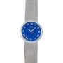 The Piaget Lapis Lazuli Dress Watch features a silver mesh band, blue face, and Roman numerals with the Piaget logo on the dial.