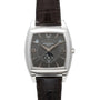 A Patek Philippe Gondolo Annual Calendar wristwatch featuring a dark face, silver markers, and a brown leather strap.
