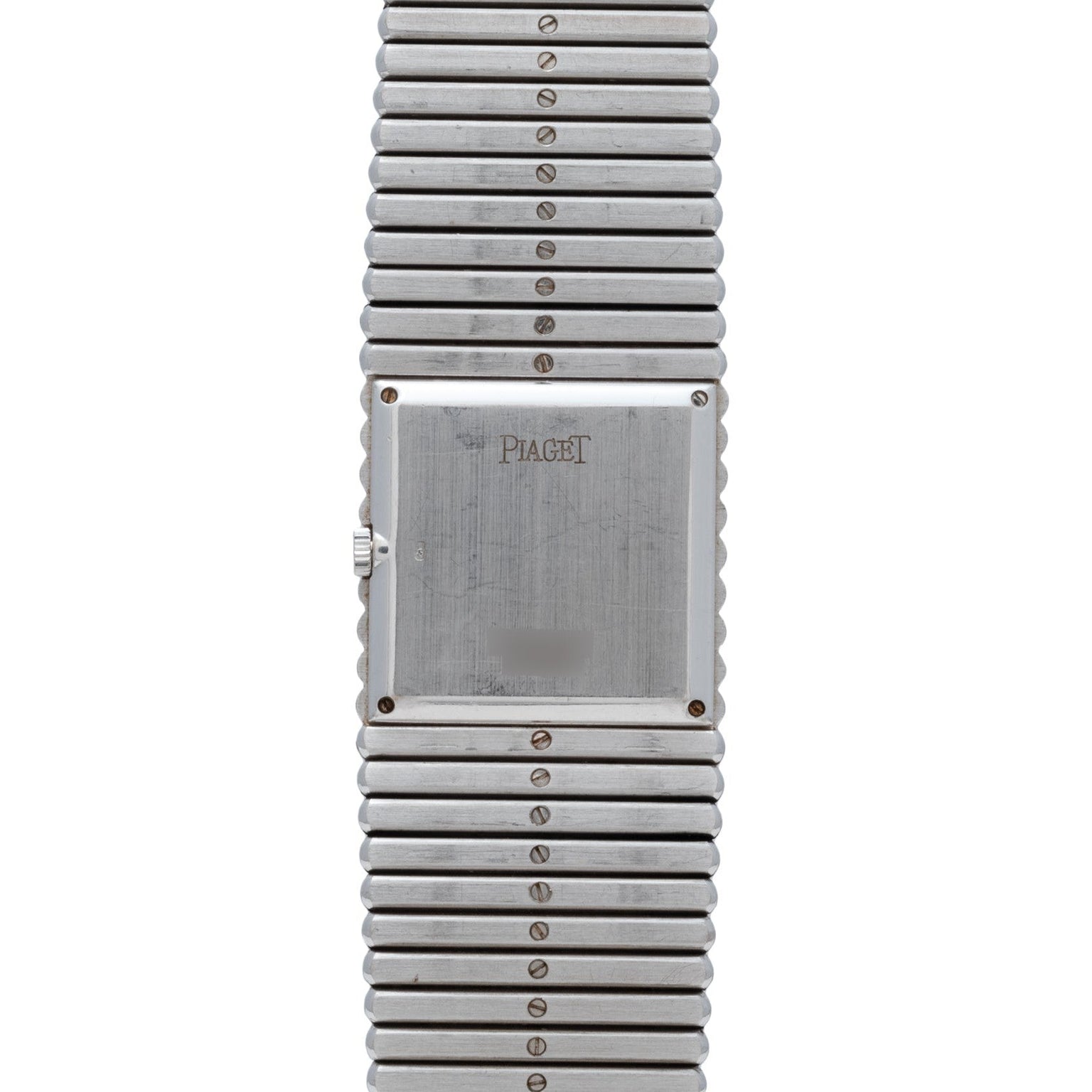 The Piaget Emperador Diamond is a rectangular silver wristwatch with a metal band and visible screws.