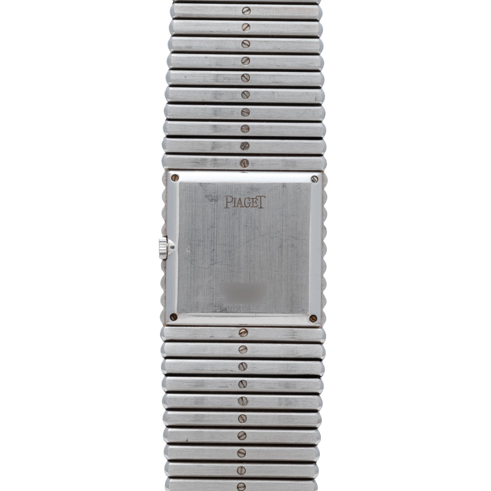 The Piaget Emperador Diamond is a rectangular silver wristwatch with a metal band and visible screws.
