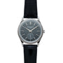 The Patek Philippe Calatrava wristwatch features a black leather strap and a dark gray dial for elegant time display.