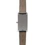 Back view of the Cartier Tank Cintrée Limited Edition wristwatch with a rectangular case and leather strap, featuring engraved details.