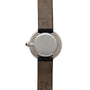 Back view of the Cartier Vendome Diamond wristwatch, featuring a round silver case with brown leather straps and an engraving that reads Paris.