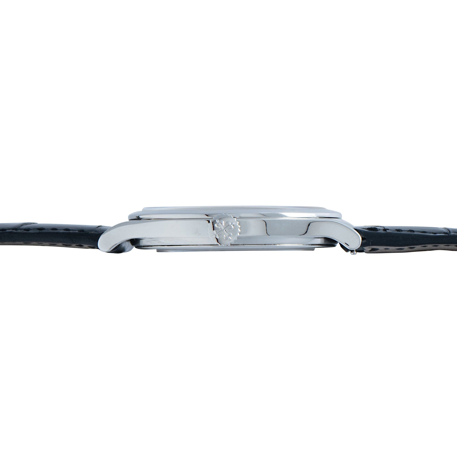 Side view of the Patek Philippe Calatrava Cloisonné Iris & Night Fireflies silver wristwatch with a black leather strap and a textured crown.