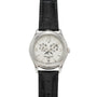 The Patek Philippe Annual Calendar Moonphase features a white dial with Arabic numerals, black hour and minute hands, moon phase display, annual calendar, date window at 6 o'clock, white gold case, and a black leather strap.