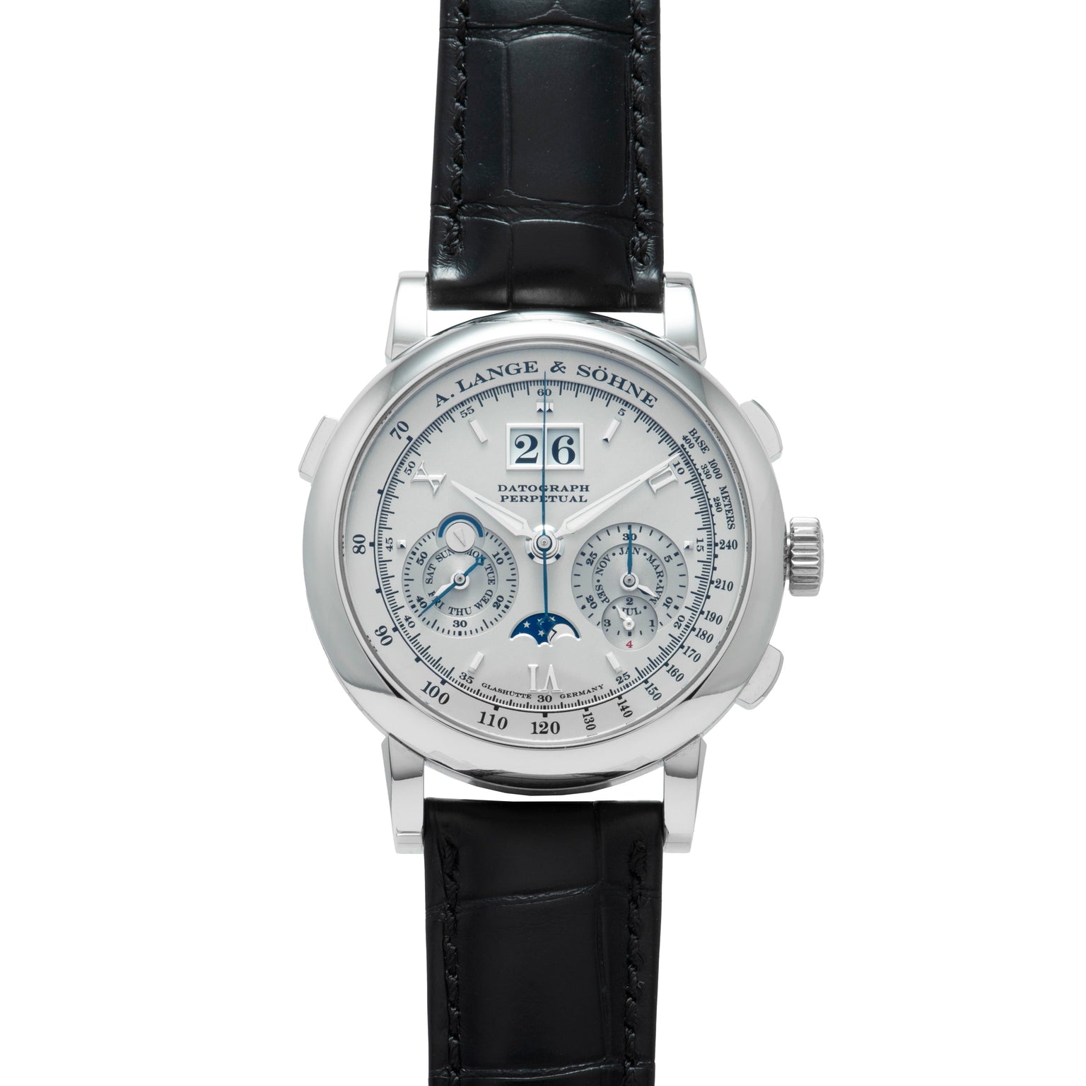 The Lange & Sohne Datograph Perpetual Calendar is a silver wristwatch with a black leather strap, multiple subdials, moon phase, and large date display.