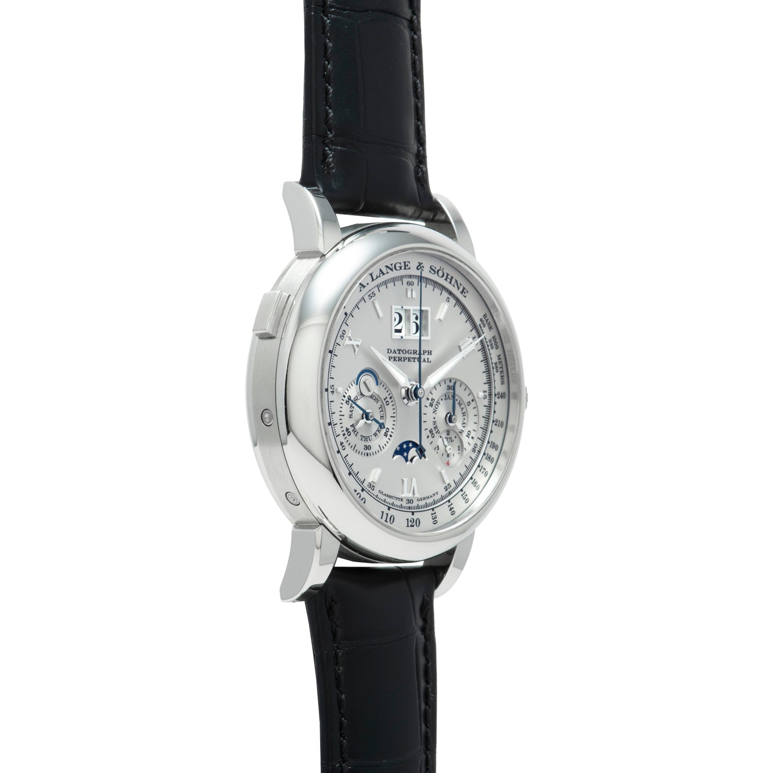 The Lange & Sohne Datograph Perpetual Calendar is a luxury silver wristwatch with a black leather strap, featuring multiple dials and a moonphase display.