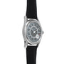The Patek Philippe Calatrava is a silver wristwatch with a black leather band and a round black dial featuring the date around the edge.