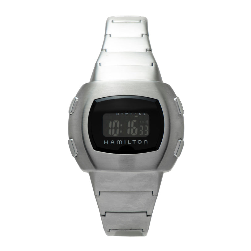 Silver-tone digital watch with black rectangular display showing time and Hamilton branding on metal band.