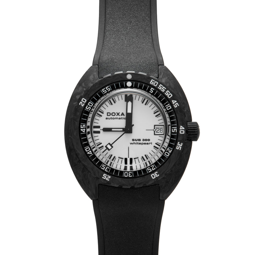 DOXA Sub 300 automatic watch with white dial, black carbon case, and black rubber strap.