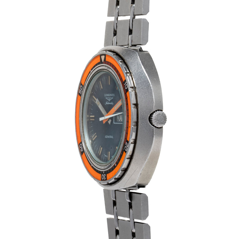 Stainless steel dive watch with black dial, orange bezel, and matching metal bracelet.