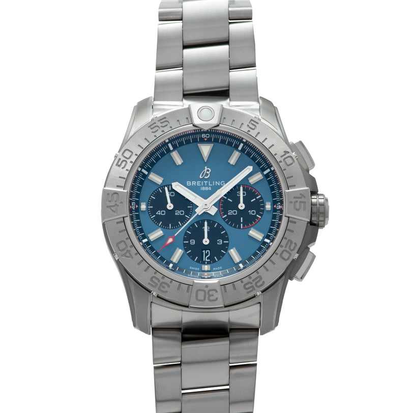 Stainless steel chronograph watch with blue dial, white hour markers, three subdials, and matching metal bracelet.