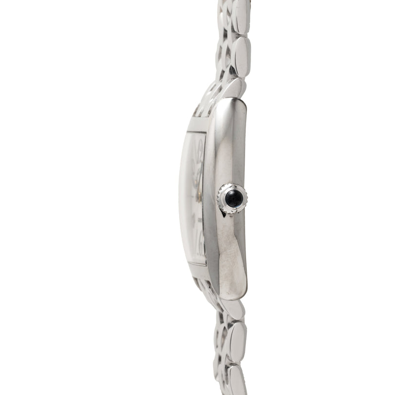 Platinum watch with curved rectangular case, black dial with crown pushbutton, and linked metal bracelet shown from side view