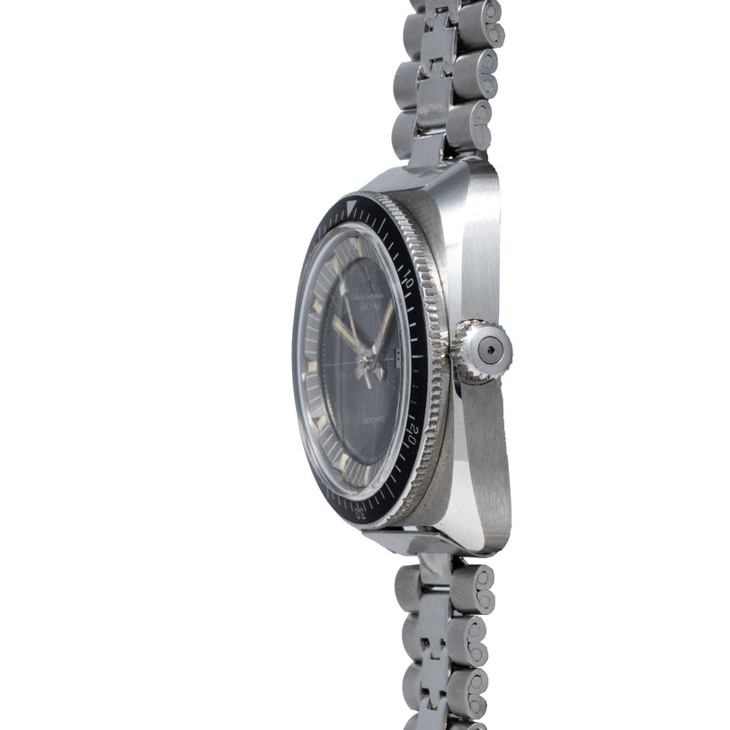 Stainless steel diver watch with black dial, rotating bezel, and matching metal bracelet.