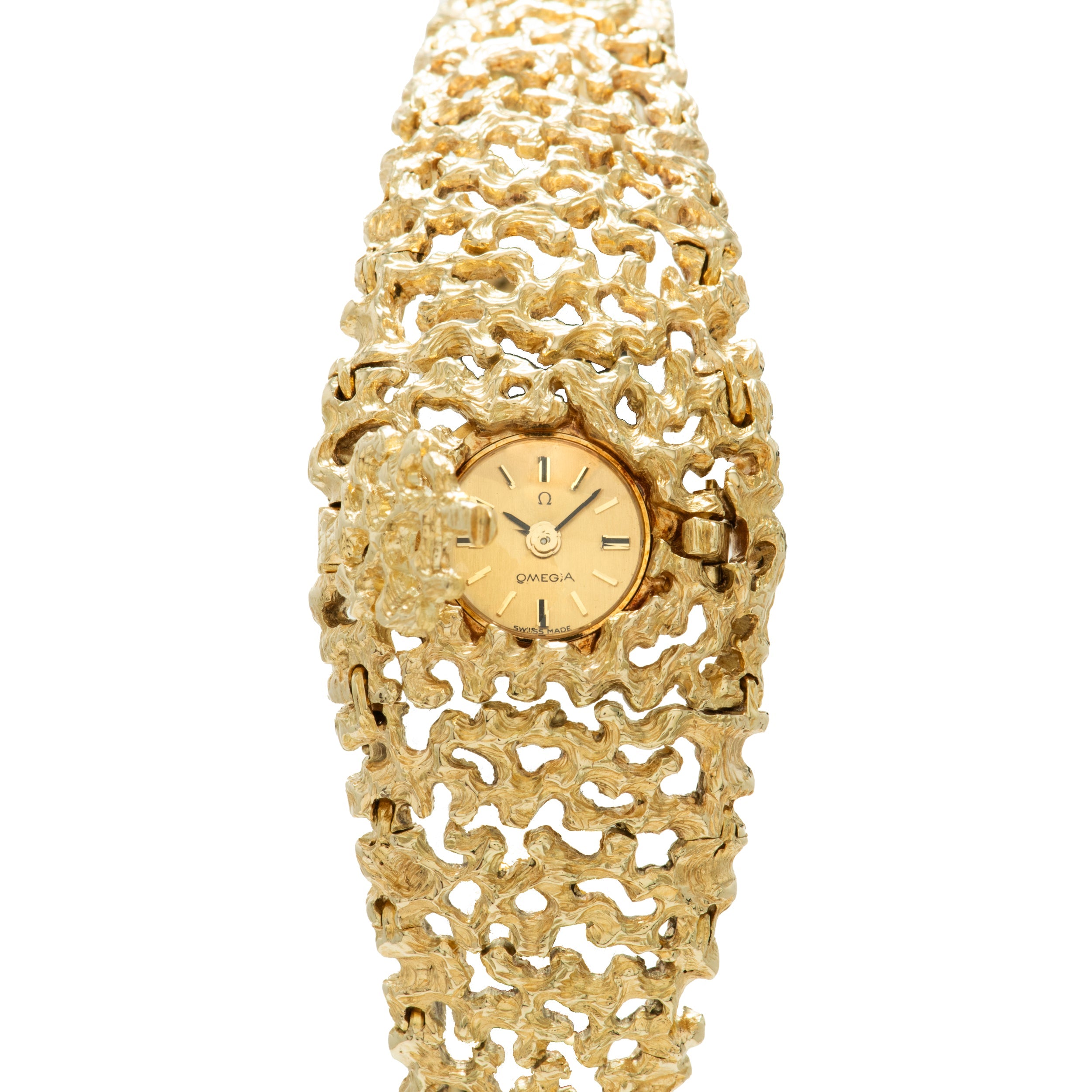 Gold-tone Omega bracelet watch with textured organic pattern and circular dial with index markers.