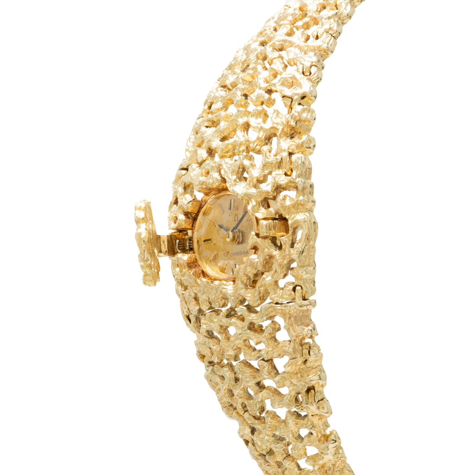 Gold textured bracelet watch with small round dial and hinged cover, featuring intricate openwork band design.