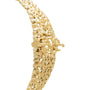 Gold openwork bracelet watch with ornate filigree design and textured surface throughout band and case.