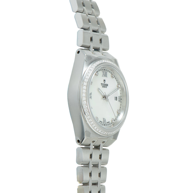 Steel watch with silver dial, diamond bezel, Roman numerals, and linked metal bracelet.