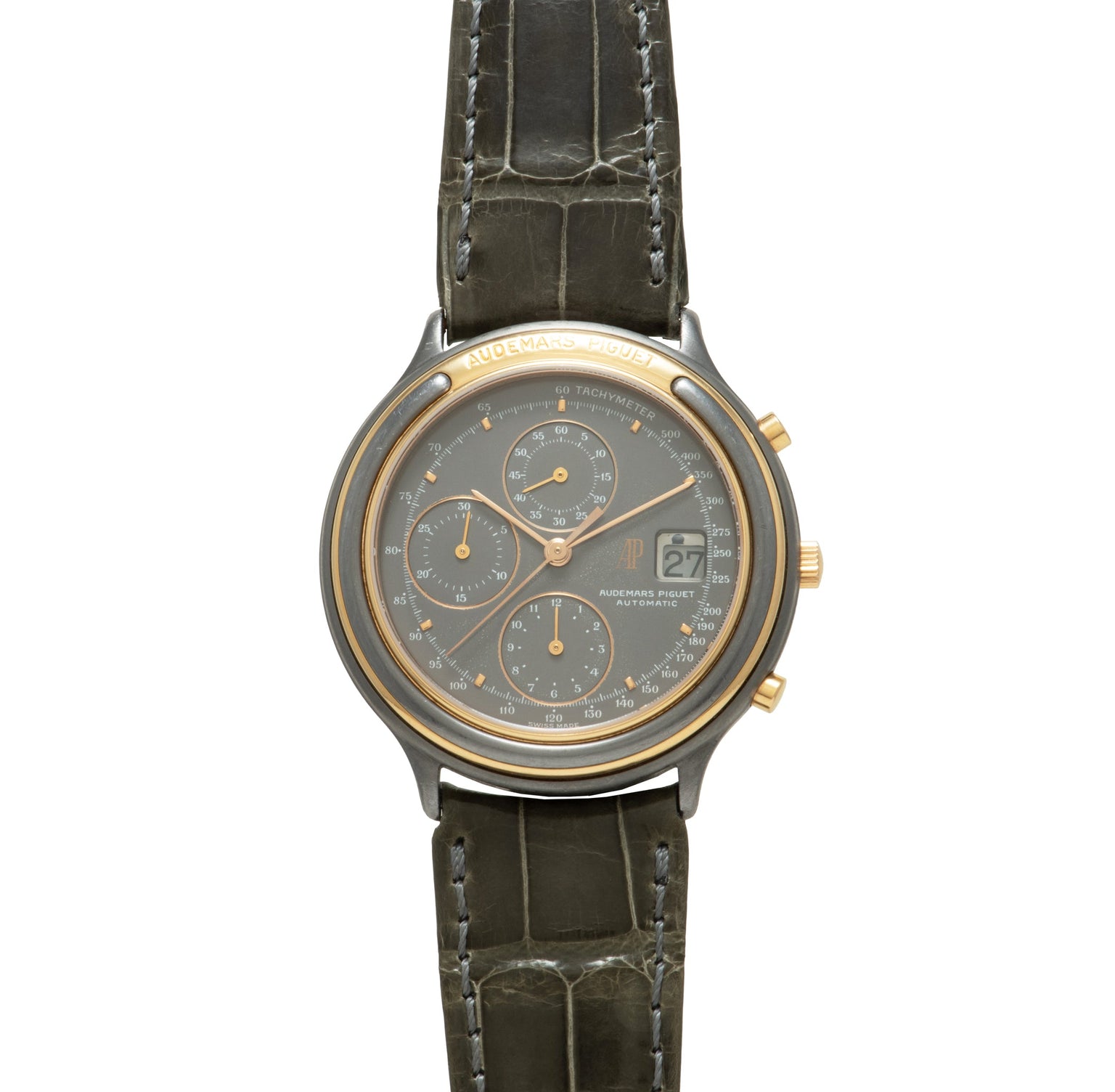 Two-tone chronograph watch with dark gray dial, three subdials, date window, and crocodile leather strap with white stitching