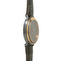 Steel and gold chronograph watch with dark dial, multiple subdials, and crocodile leather strap.