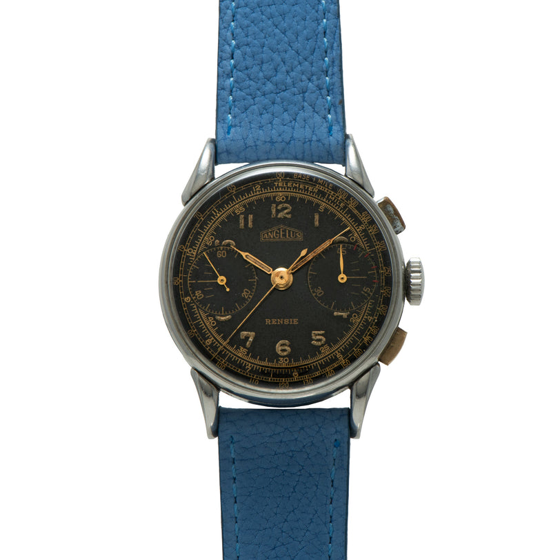 Angelus Chronograph Rensie with black dial, gold hands, and blue textured leather strap.