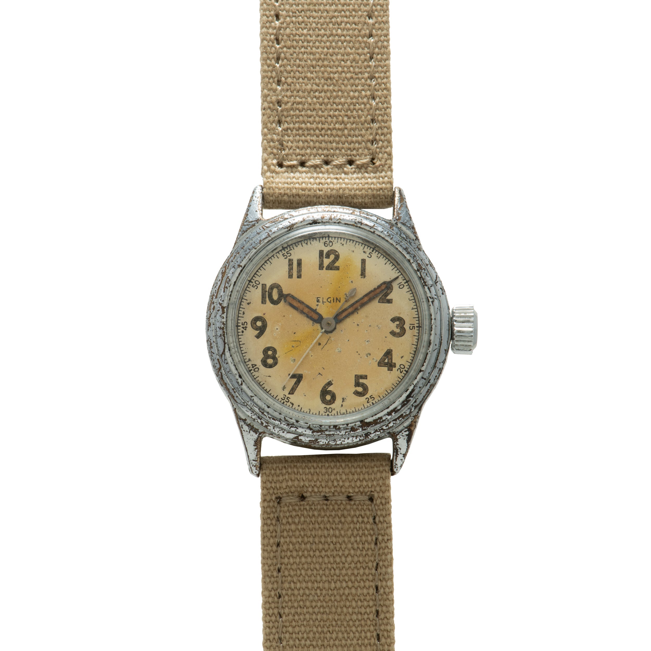 Elgin military watch with weathered steel case, cream dial with Arabic numerals, and tan fabric strap.