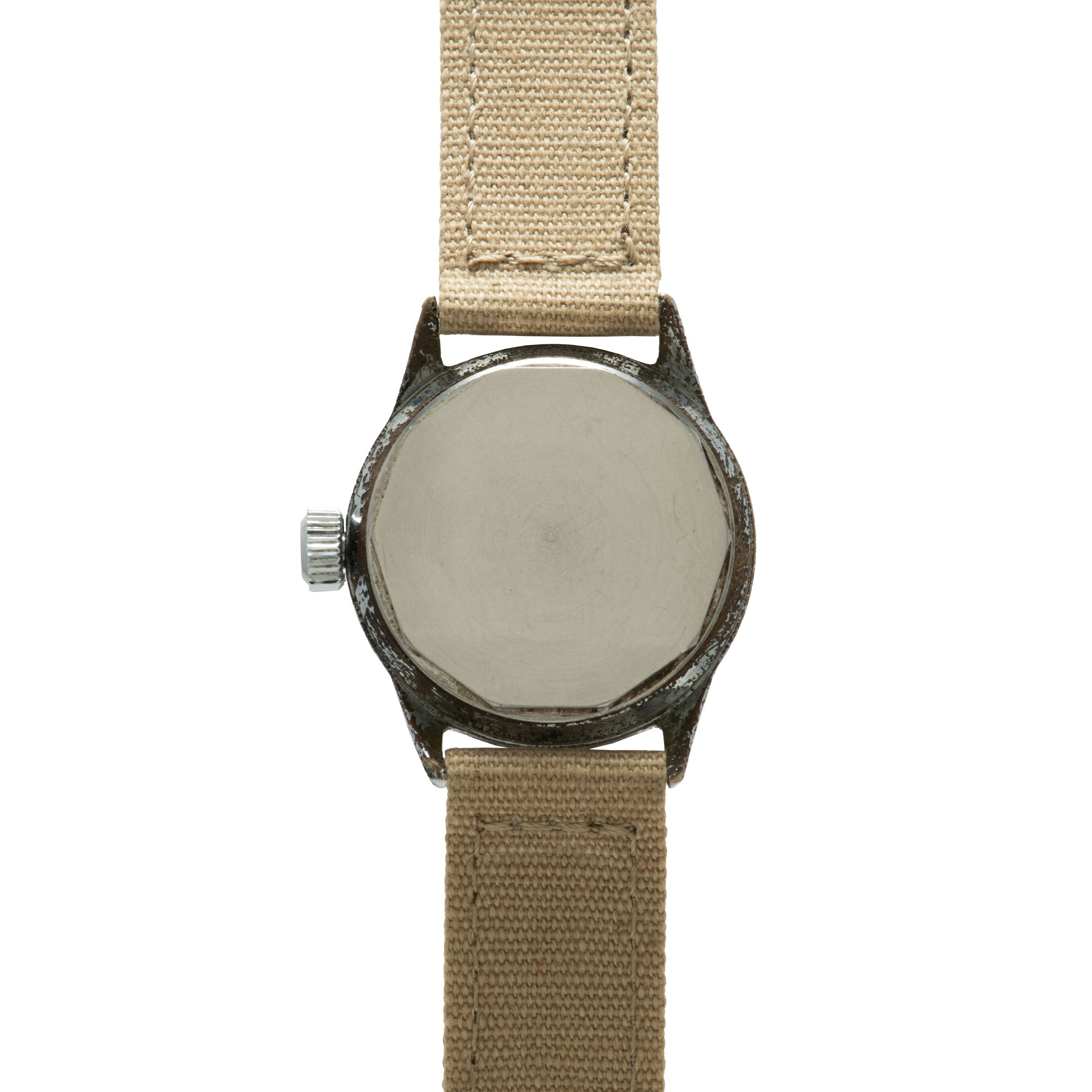 Watch with dark metal case, blank silver dial, and tan canvas strap.