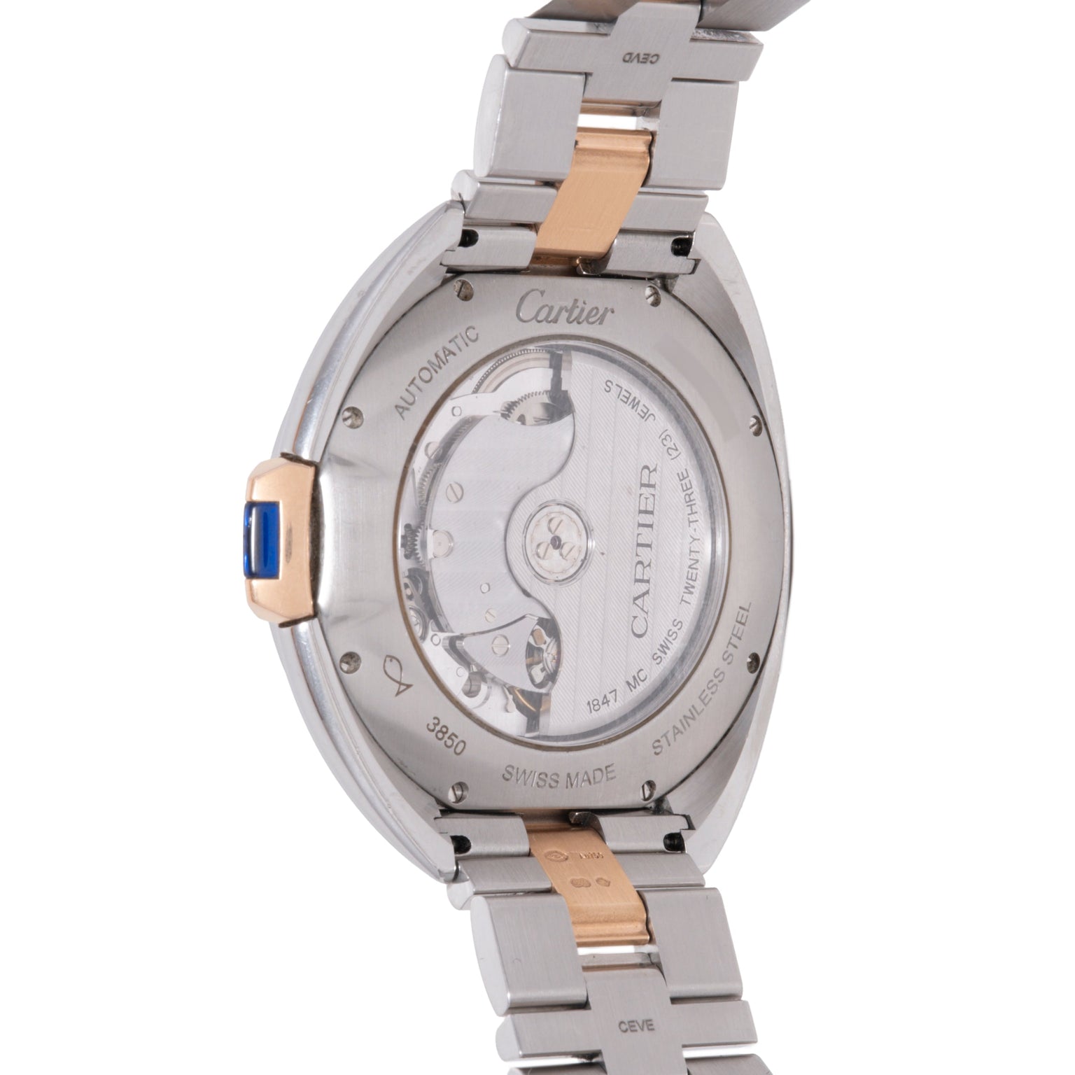 Cartier watch back showing stainless steel case, two-tone bracelet, and visible automatic movement through sapphire crystal.