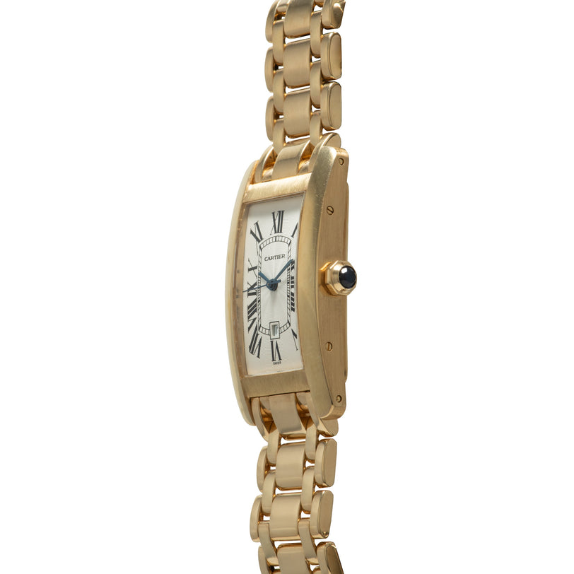 Gold-tone rectangular watch with white dial, Roman numerals, and matching link bracelet.
