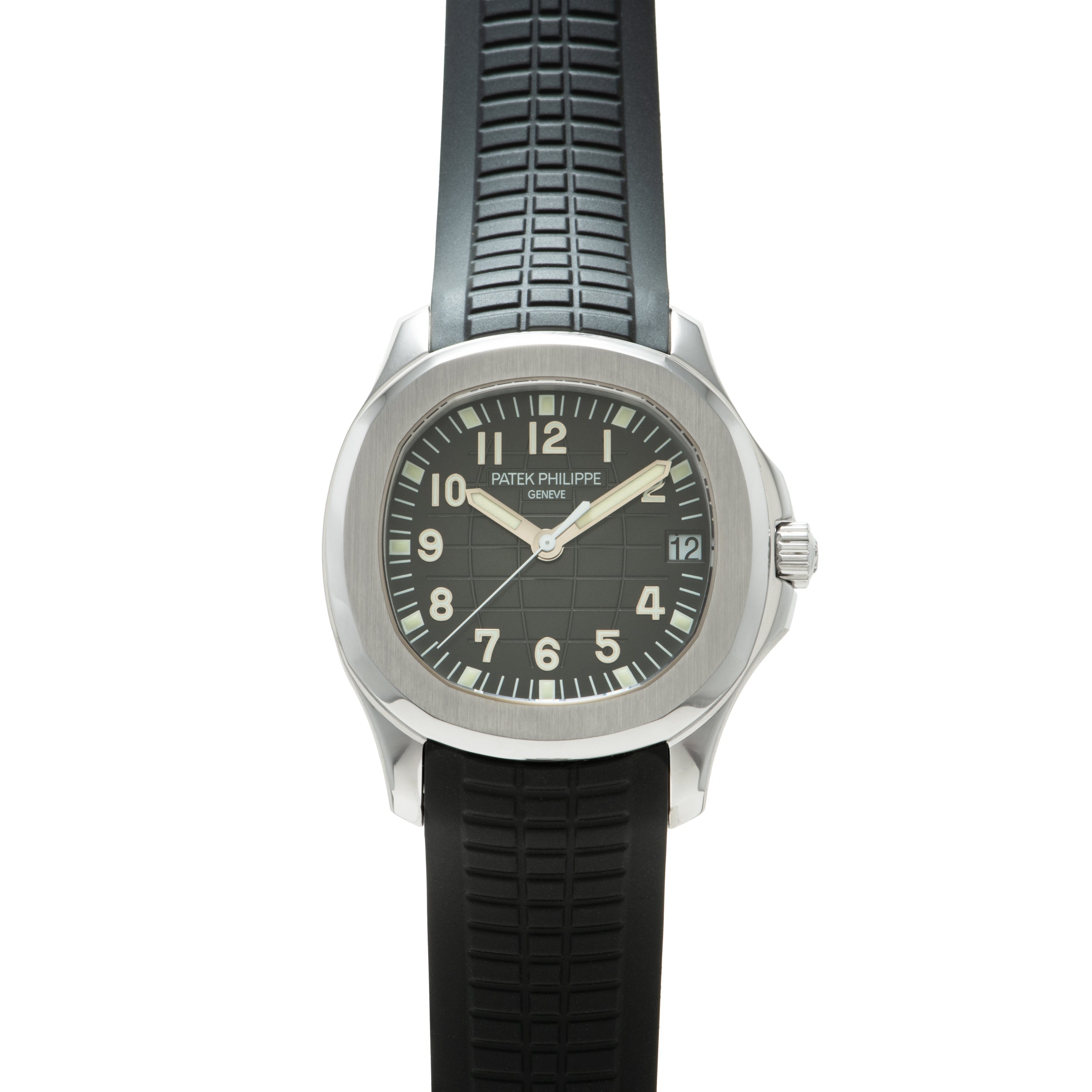 Stainless steel watch with dark dial, Arabic numerals, and black rubber strap with grid pattern.