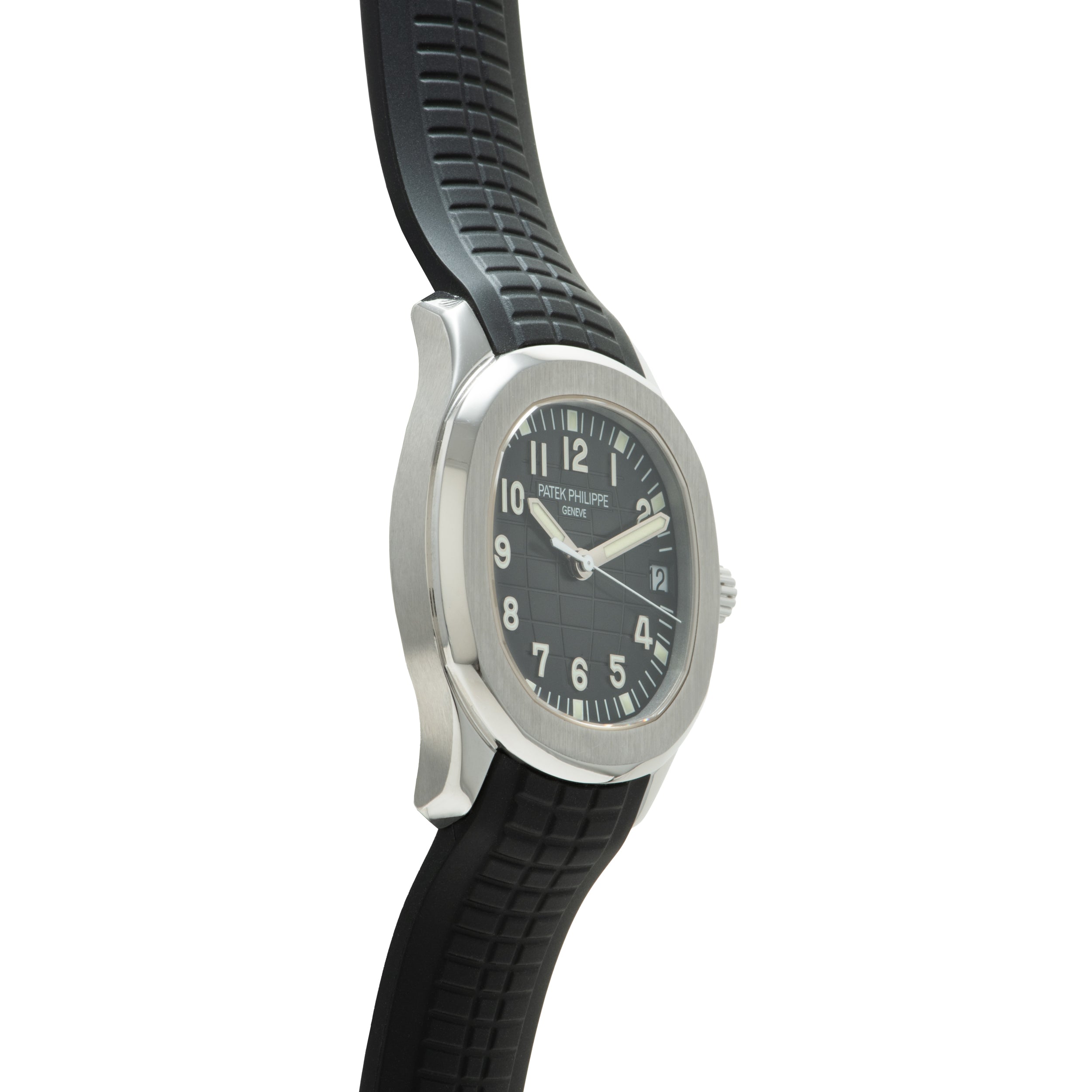 Silver-toned watch with black dial and Arabic numerals, attached to black quilted rubber strap.