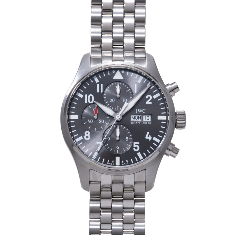 Silver stainless steel chronograph watch with dark dial, multiple subdials, date window, and linked metal bracelet.