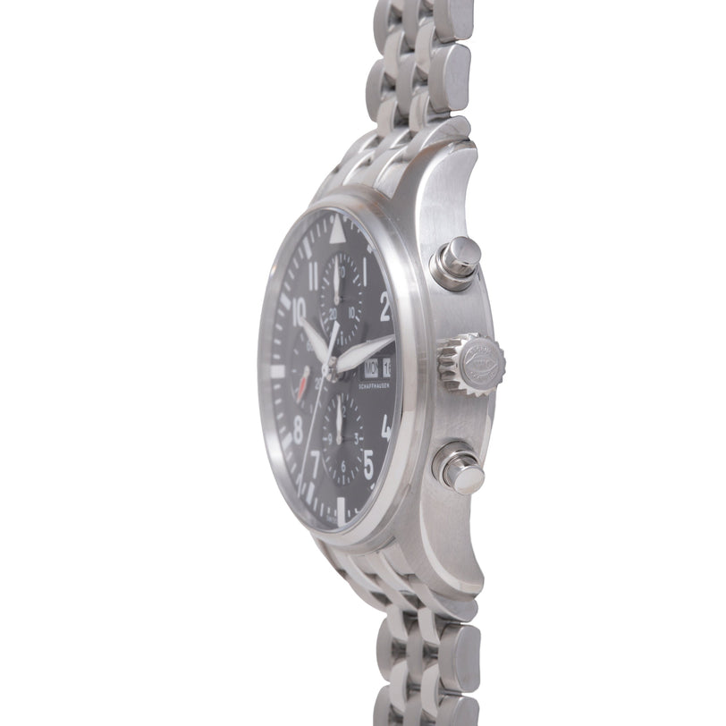 Stainless steel pilot's chronograph with black dial, Arabic numerals, chronograph subdials, and linked bracelet.