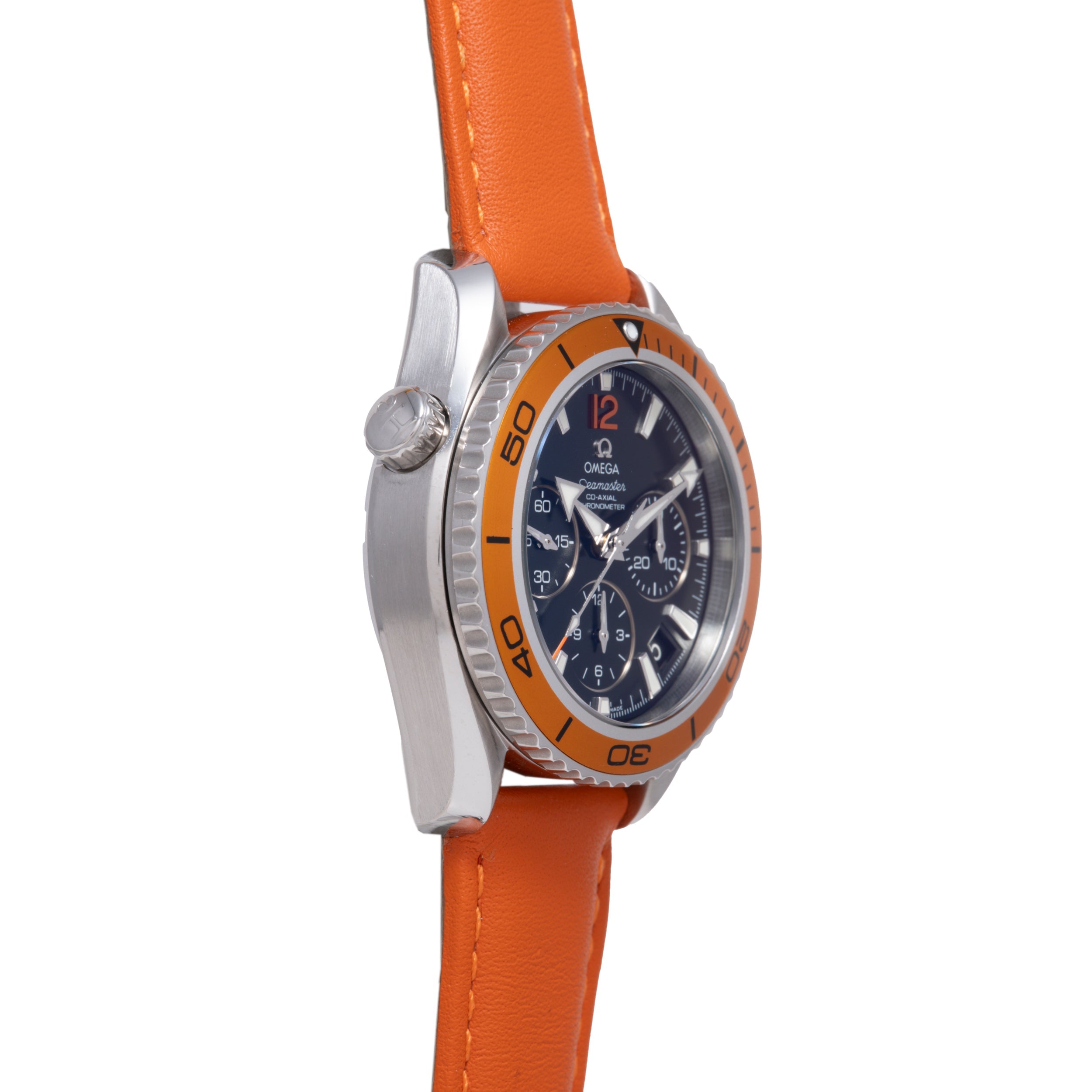 Stainless steel watch with dark blue chronograph dial, orange rubber bezel, and orange leather strap.