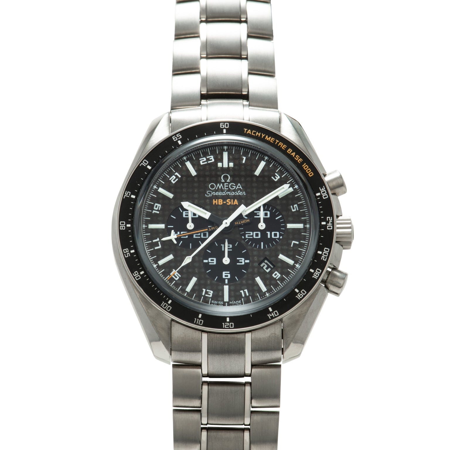 Omega Speedmaster chronograph watch with black dial, tachymeter bezel, and titanium metal bracelet.