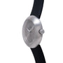 Silver-brushed round watch with minimalist dial, hour markers, and black rubber strap.