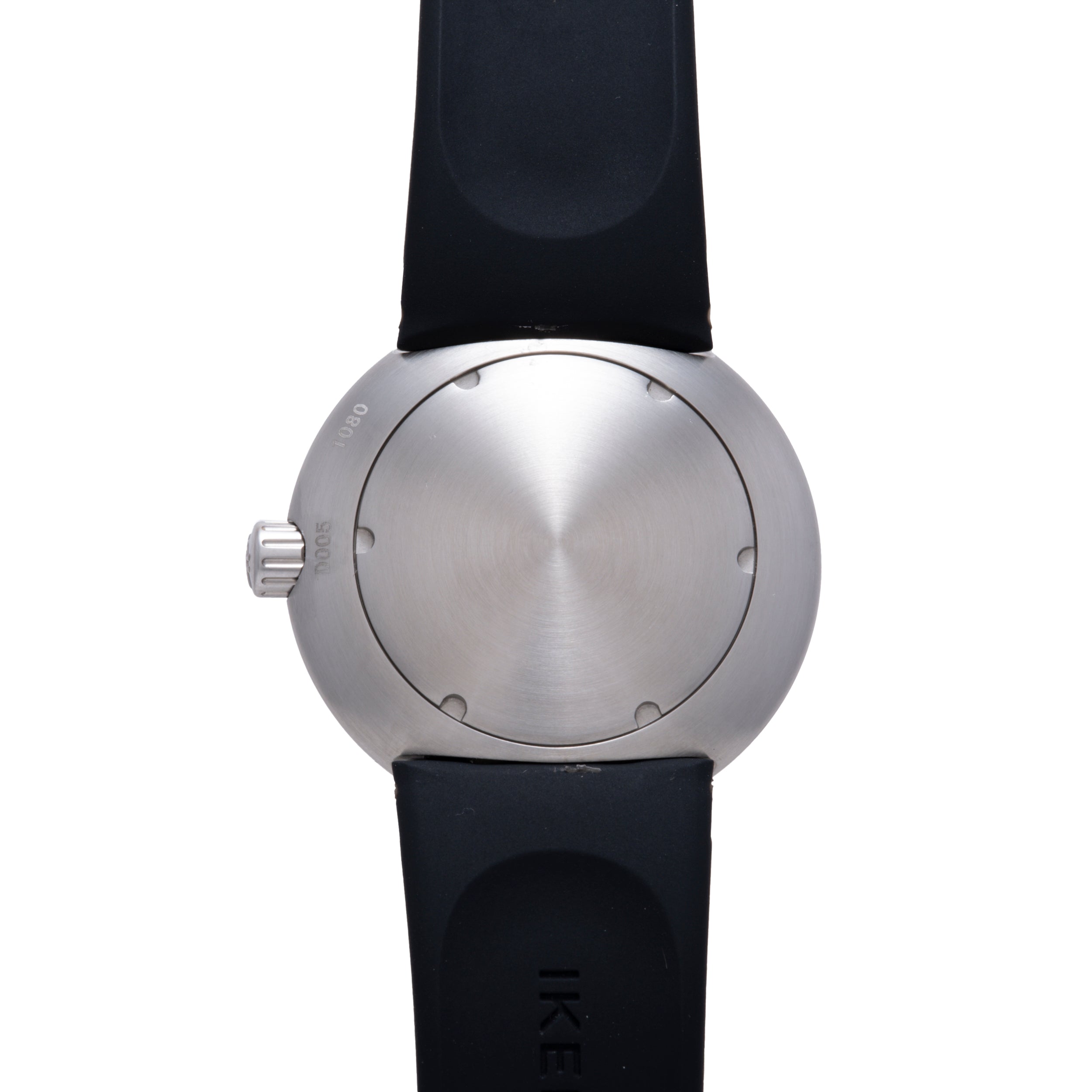 Ikepod Duopod watch with brushed silver spherical case, black rubber strap, and crown at 3 o'clock position.
