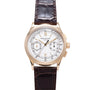 Rose gold chronograph watch with white dial, Roman numerals, two subdials, and dark brown leather crocodile strap.