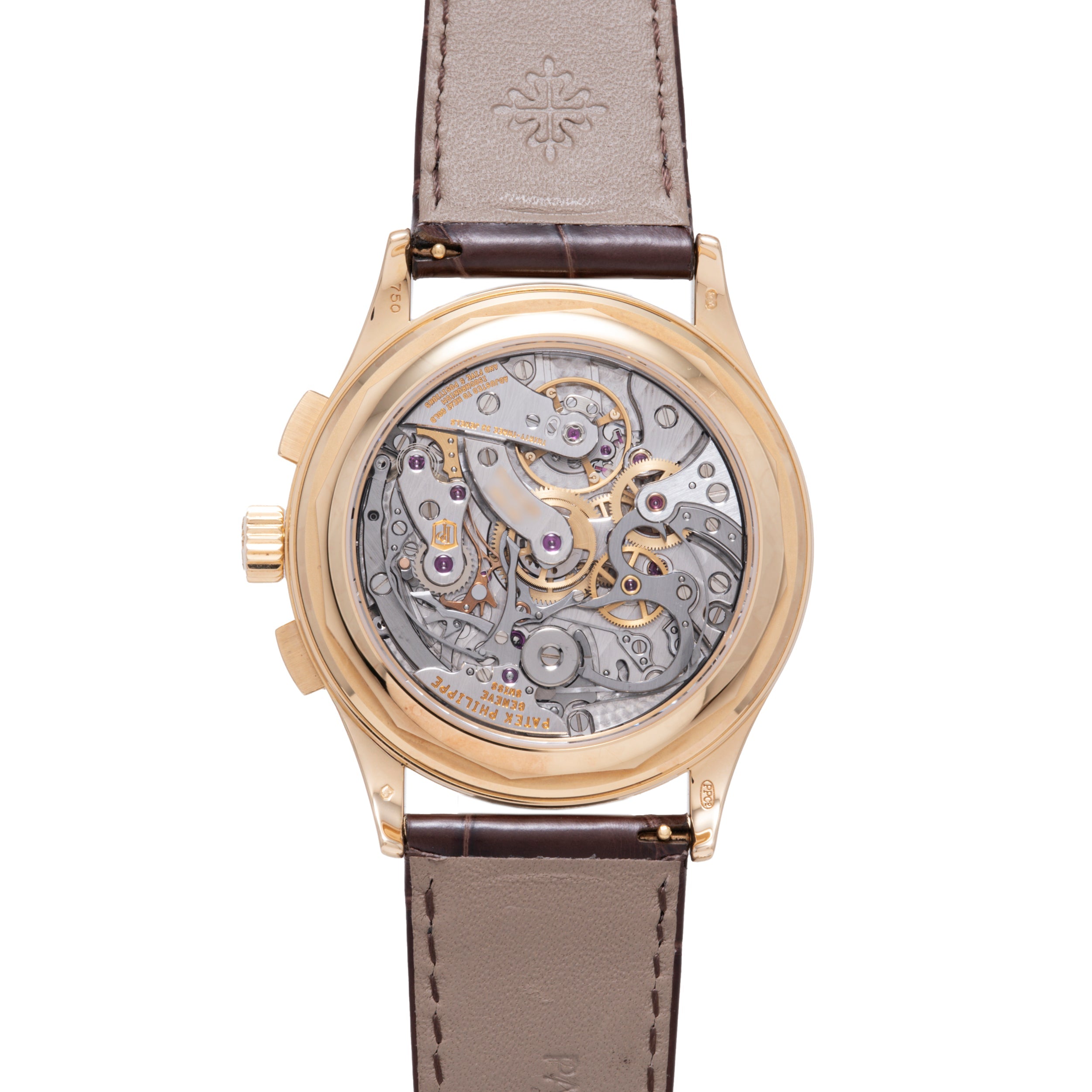 Gold-tone chronograph watch with visible skeletal movement, brown leather strap, and exhibition caseback.