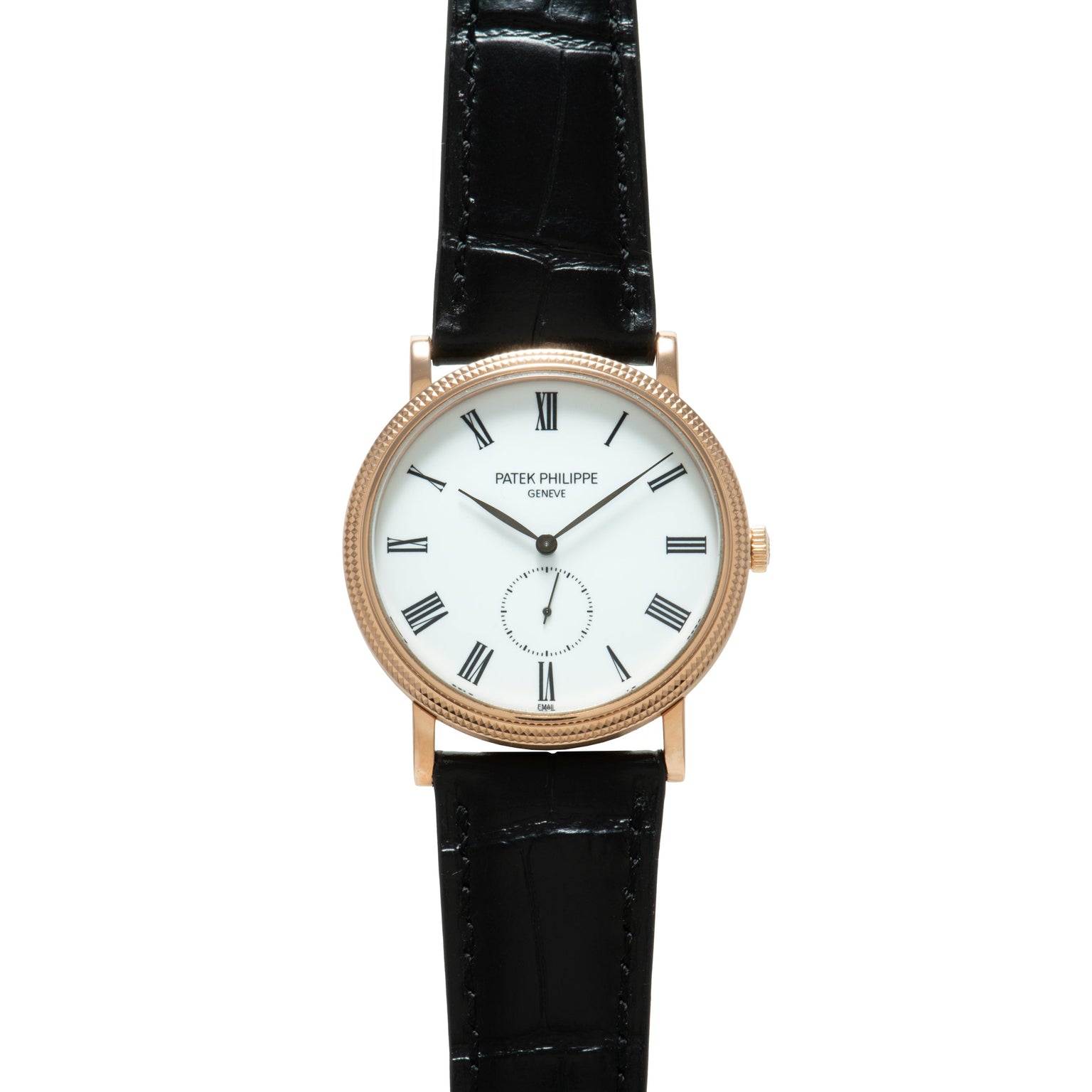 Patek Philippe Calatrava watch with rose gold case, white dial, Roman numerals, and black leather strap.