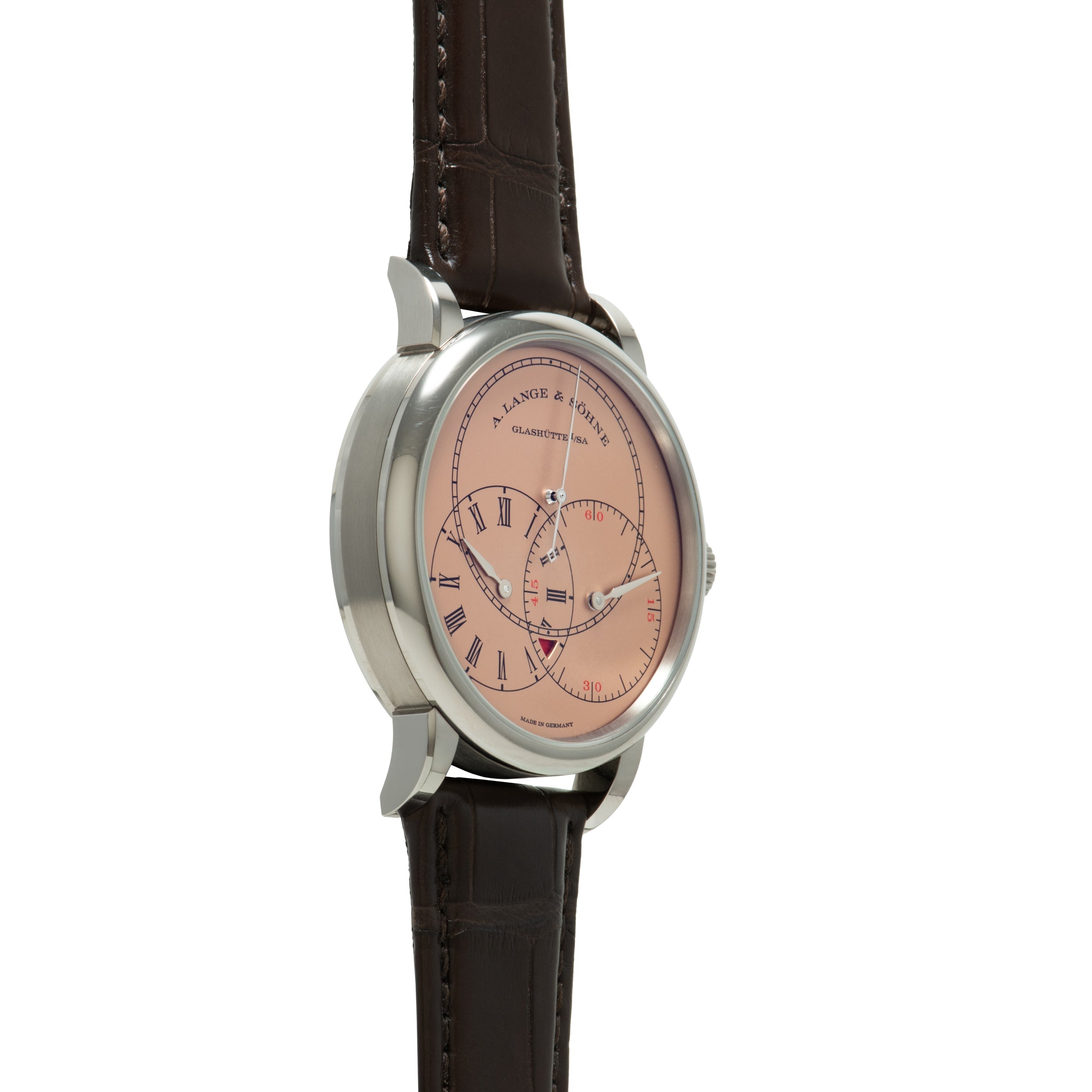Silver-toned wristwatch with salmon dial, Roman numerals, dual subdials, and dark brown leather strap.