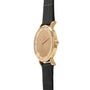 Gold-toned oval watch with champagne dial, Arabic numerals, and black leather strap.