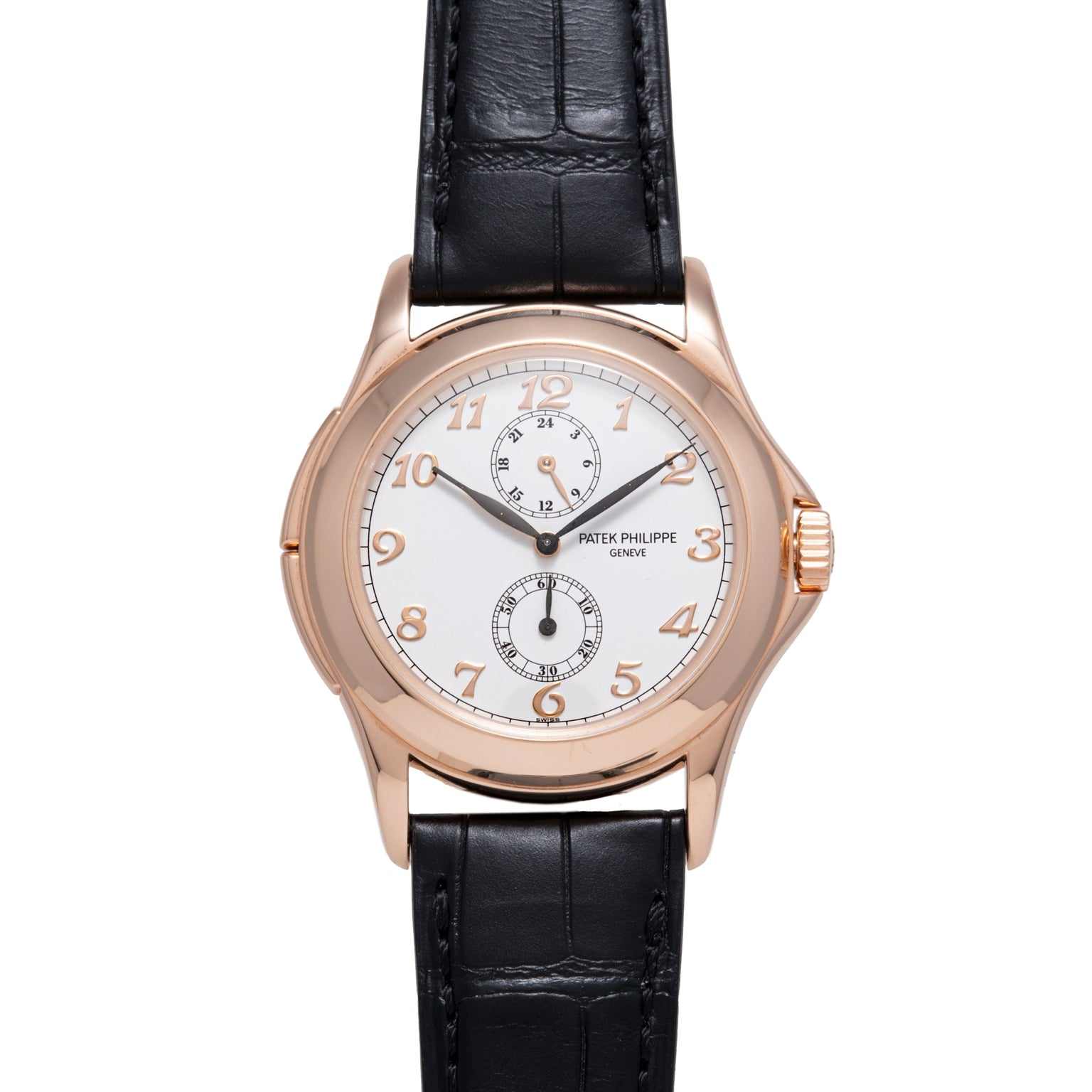 Rose gold watch with white dial, Arabic numerals, two subdials, and black leather strap.